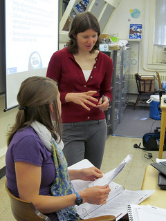 Claudia Lutz interacts with a participant at a teacher workshop